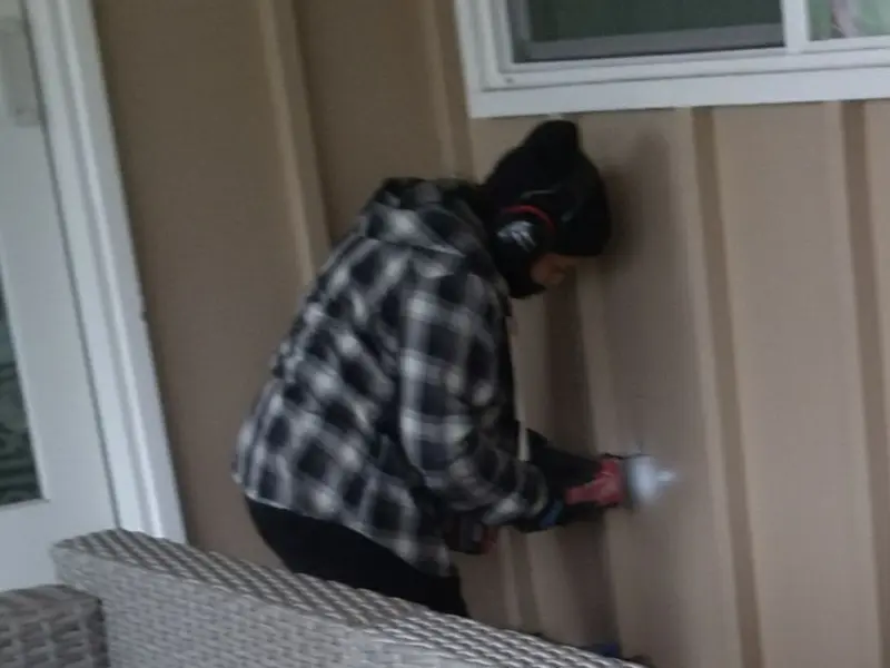 Professional electrician installing an exterior outlet in Upper Leacock