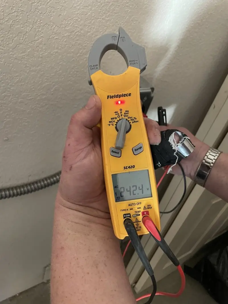 Voltage testing with clamp meter during Aluminum Wiring Replacement in Upper Leacock
